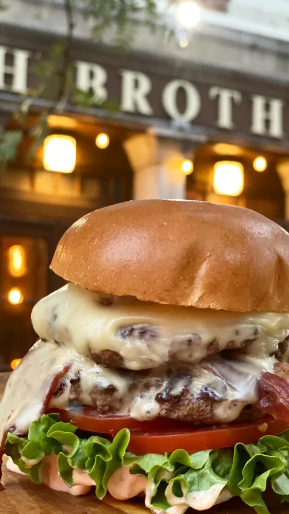 Photo of cheeseburger outside of Oh Brother restaurant