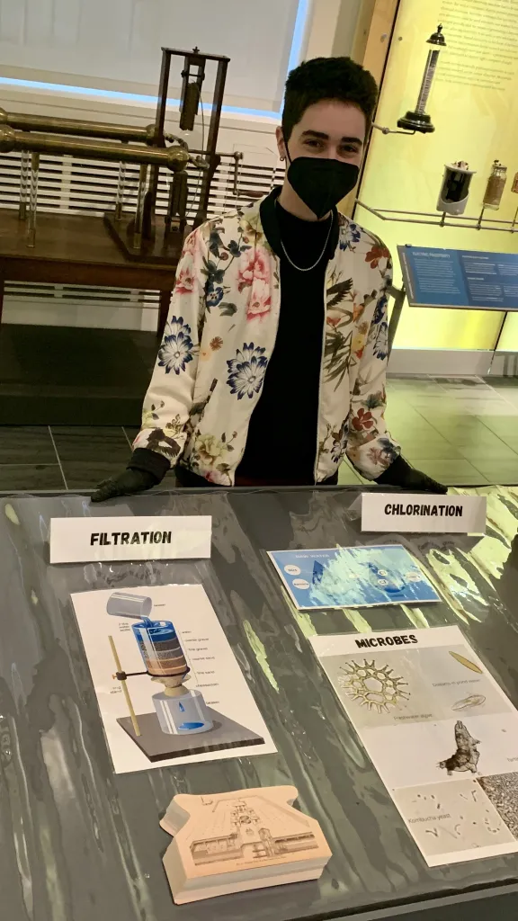 Person standing at display table at Science History Institute