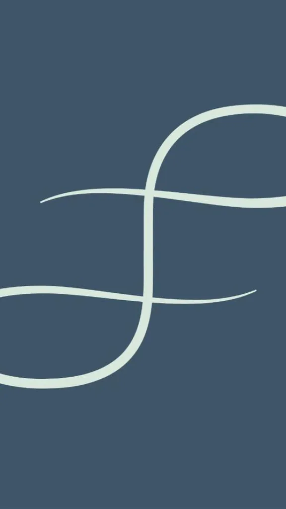 Lakshmi Hair Studio logo with blue background and capital L in cursive