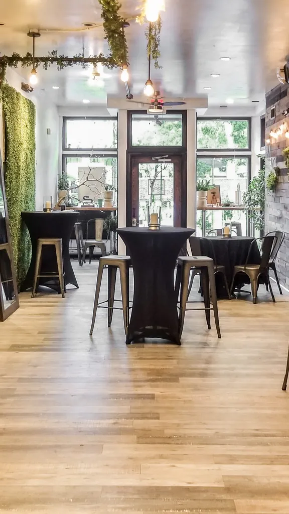 Old City Social interior with tables set up with linens