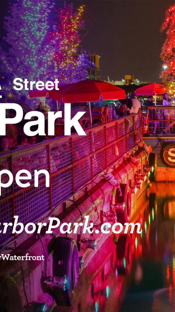 Spruce Street Harbor Park illuminated at night with lights