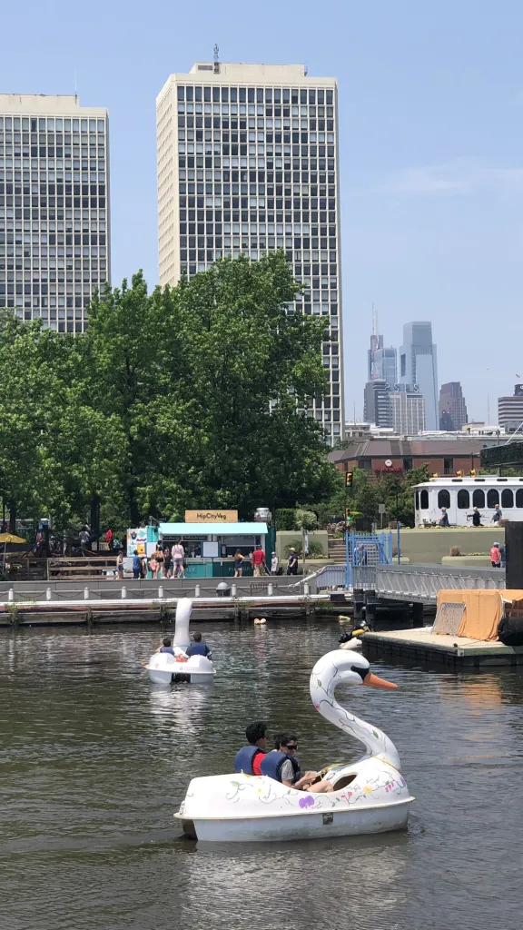People participating in Paddle Penn's Landing at the Delaware River