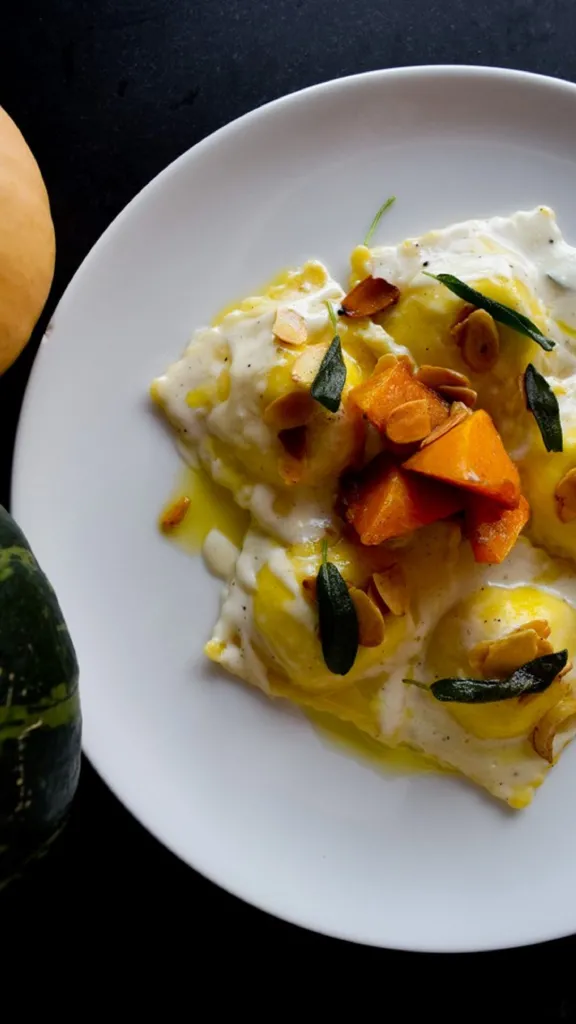 Pumpkin ravioli on a white plate