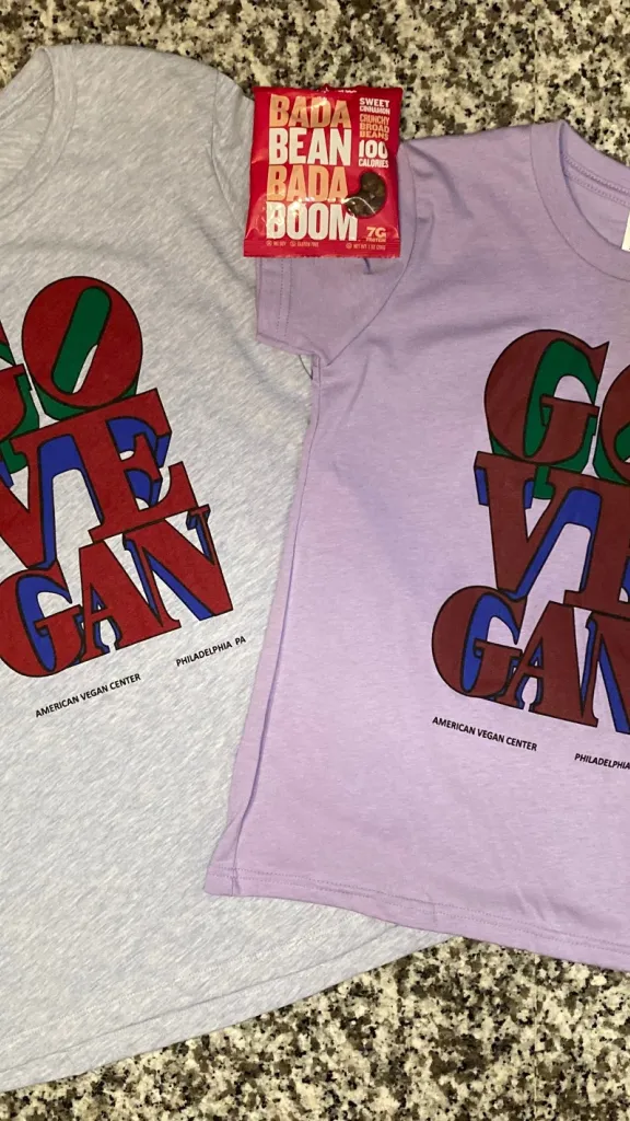 Two t-shirts that say Go Vegan