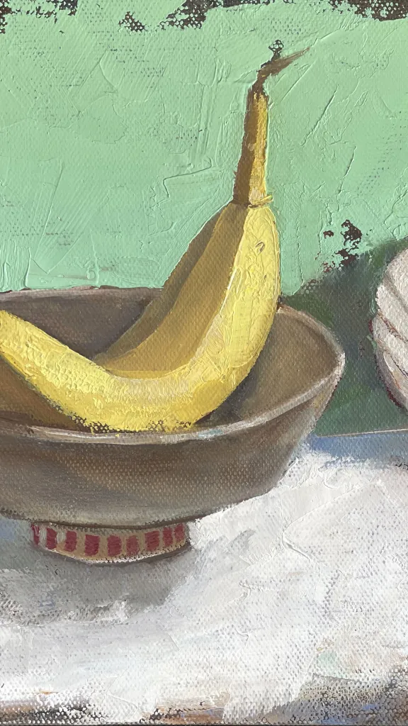 Painting of a banana in a dish and a seashell
