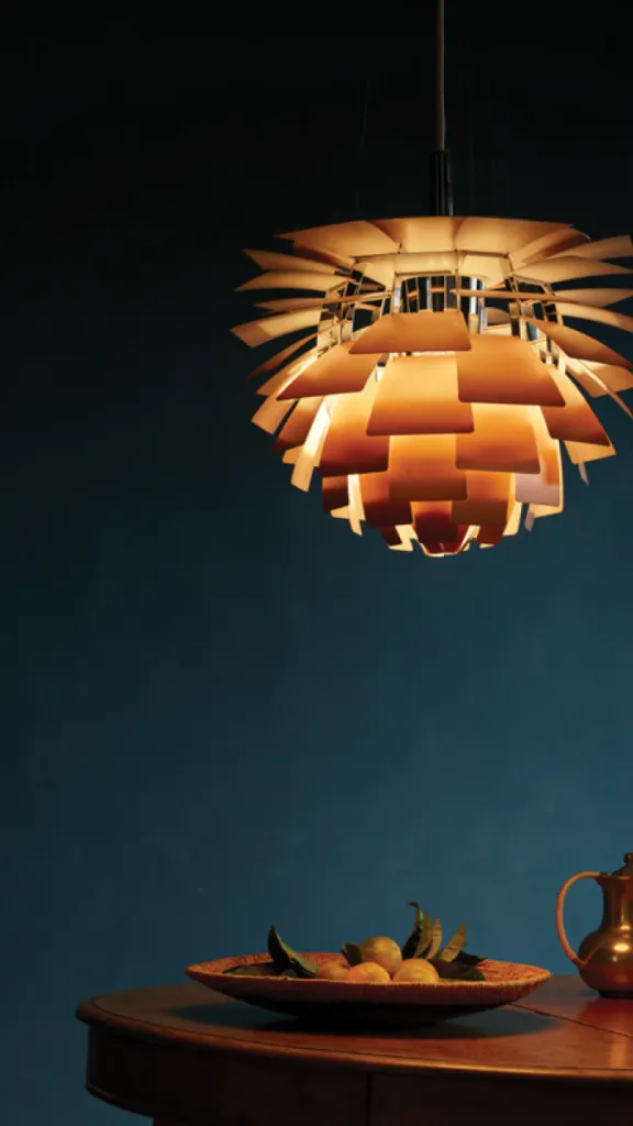 Picture of table with light and bowl of fruit