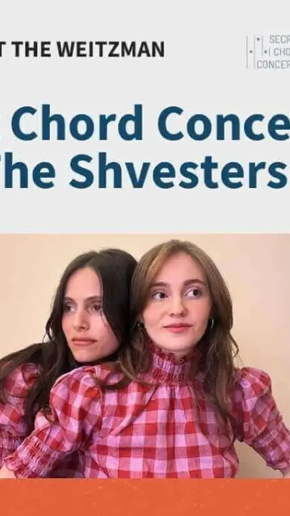 two light skinned women, one with light brown hair and one with dark brown hair hug each other wearing pink gingham shirts