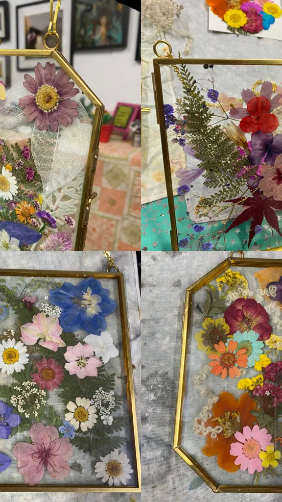 Images of gold and glass framed botanical wall hangings