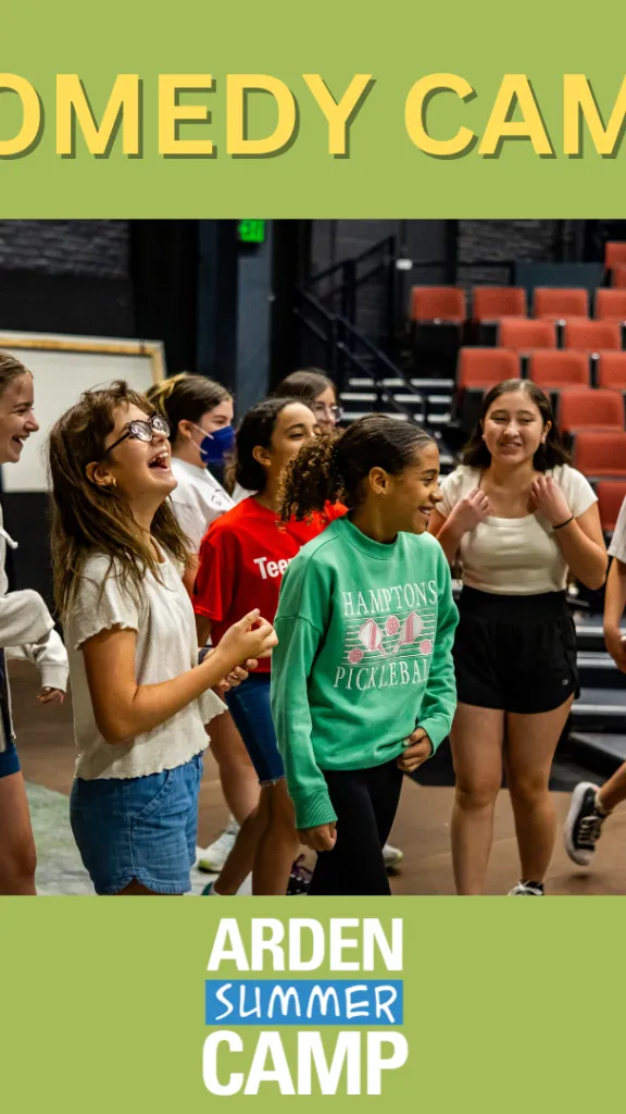 Campers laughing on stage