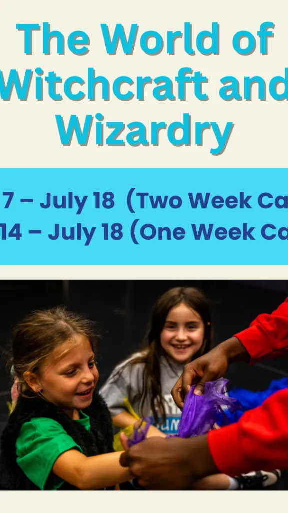 A teacher wrapping a purple piece of cloth around a student's wrist as a costume piece. Another girl smiles behind her.