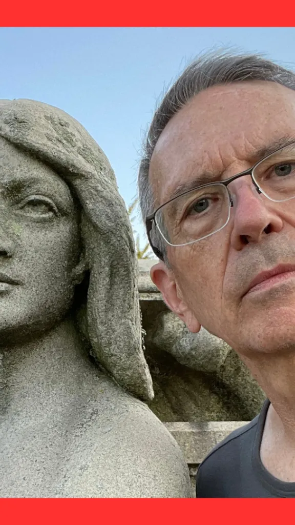 Ed Snyder photo with stone sculpture