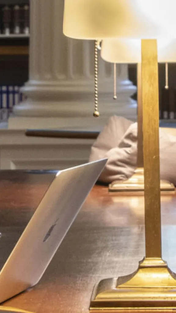 library table with 2 researchers at work