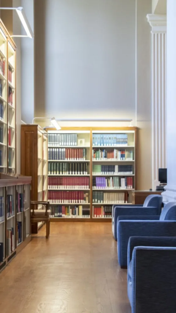 library scene with armchairs and columns