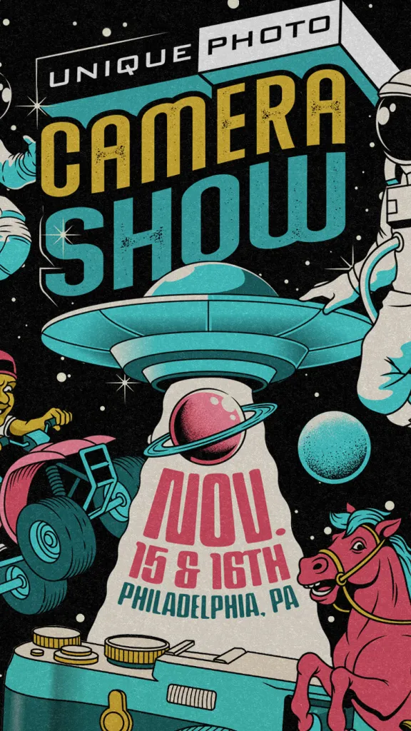 A space-themed, retro comic illustration promoting the Unique Photo Camera Show. Two astronauts float in space while a UFO beams down over a camera with a pink planet inside the beam. On the sides, a rider on a quad and a cowboy on a pink horse appear in cartoon style. Planets and stars are scattered across a dark space background. Text highlights: “Unique Photo Camera Show — Nov. 15 & 16th, Philadelphia, PA."