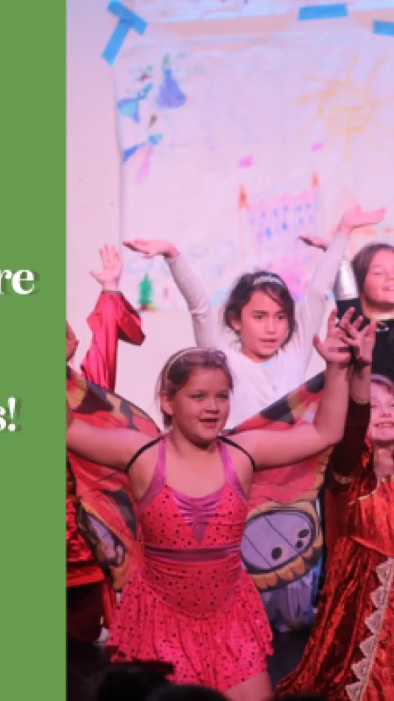 A group of small children in various costumes, posing with their arms in the air, alongside the text: 'Arden Summer Camp, Musical Theatre Camp: Showstoppers, One Week Specialty Camp for Grades 1-5.'
