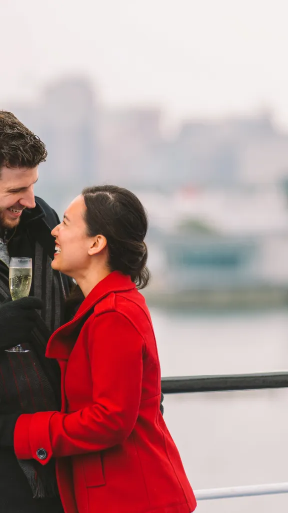 Couple outside on boat.