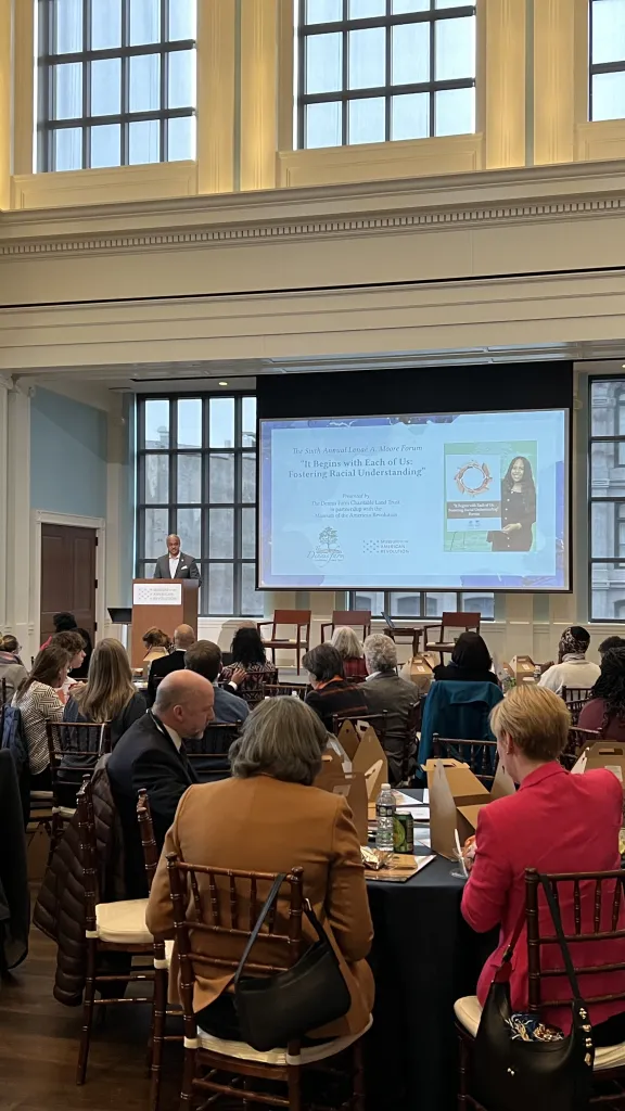 crowd of people sitting in a conference hall
