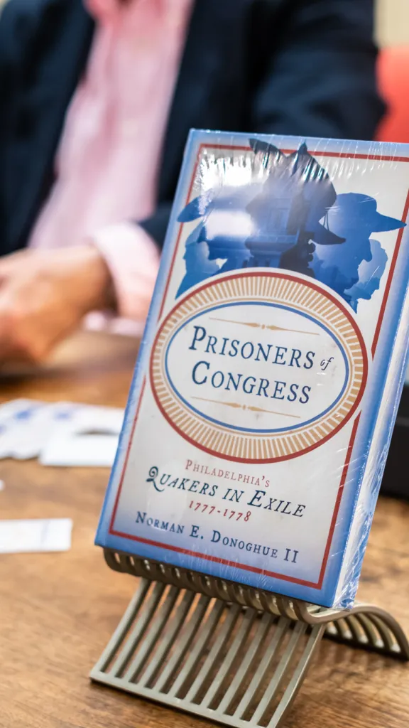 Image of author Norman Donoghue at a signing of his book, Prisoners of Congress.