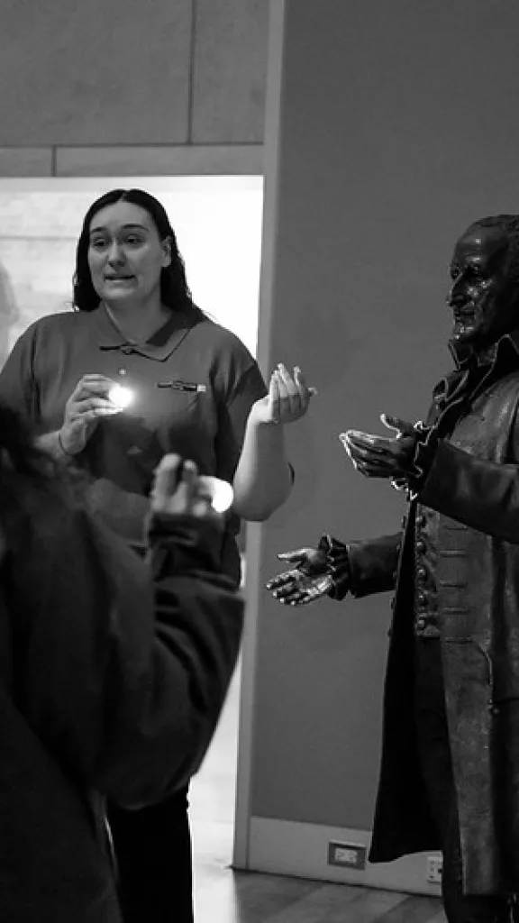 A tour guide in a museum.