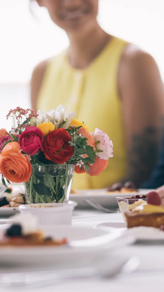 Flowers and champagne on table