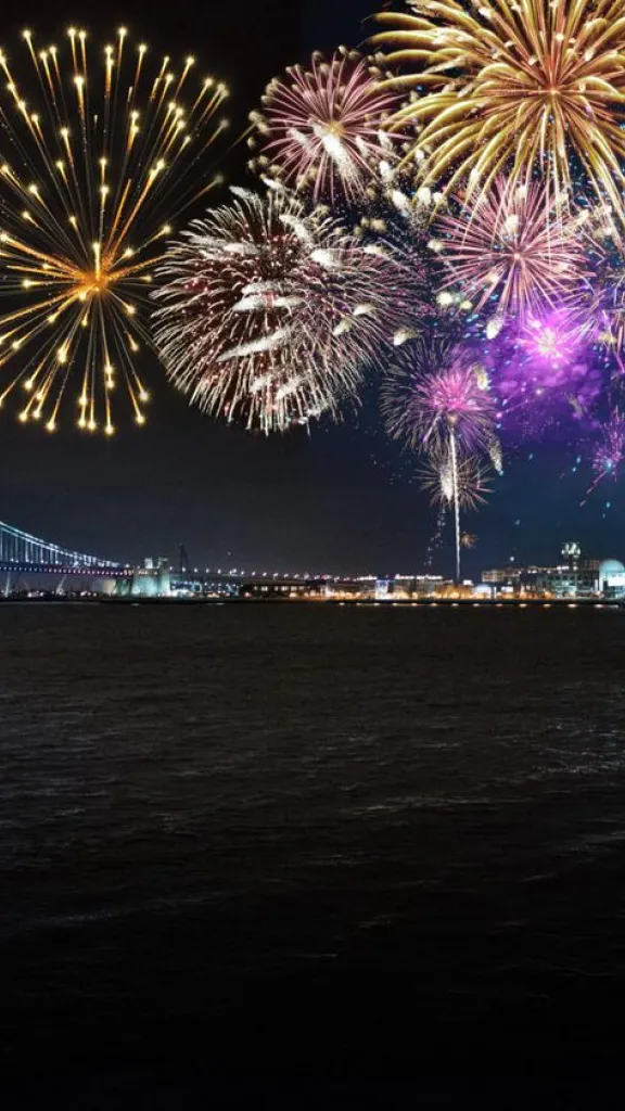 Vessel with fireworks in background