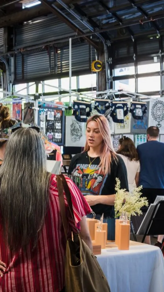 Vendor selling art at Cherry Street Pier