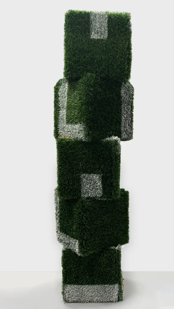 Brandon J. Donahue-Shipp | A Monument To Scrimmage | 64 x 20 x 20 inches / 162 x 50 x 50 cm, astro Turf, spray paint, wood, 2025