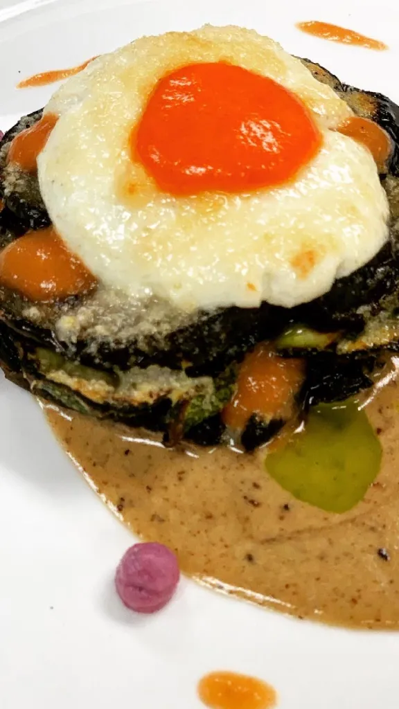 Grilled portobello and zucchini topped with parmesan and goat cheese 