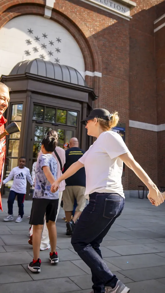 People dancing in a circle