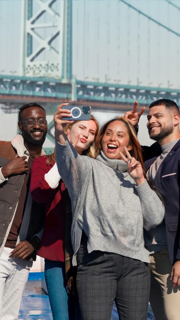 people taking selfie on boat