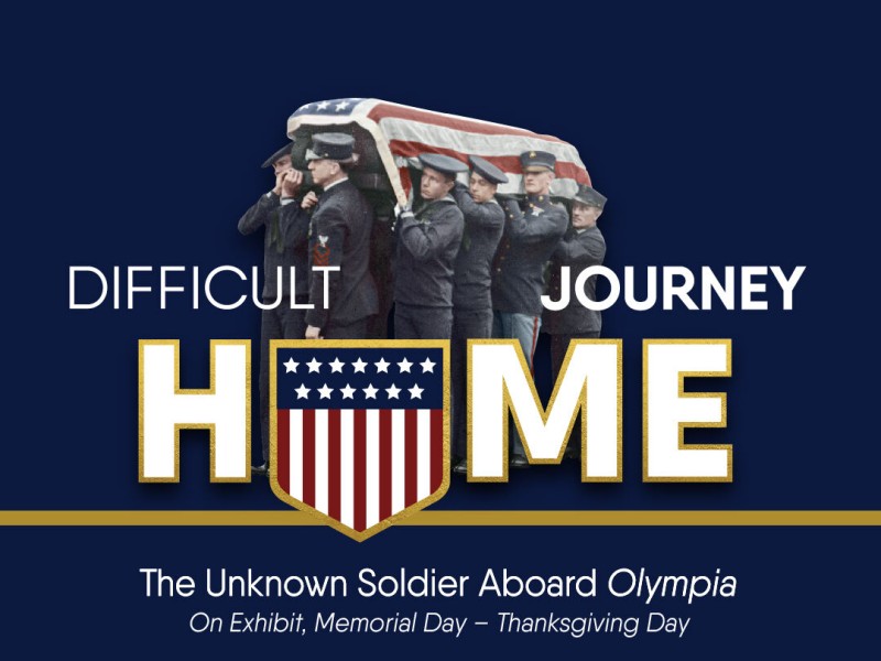 Honor guard carrying casket draped with the American flag, with text information about the exhibit