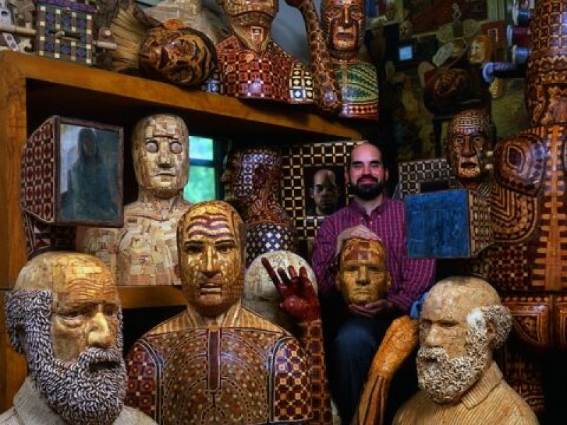 The artist surrounded by his sculptures