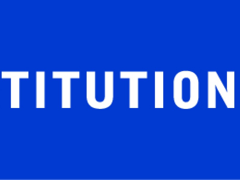National Constitution Center logo with white text, blue background, and red stripes