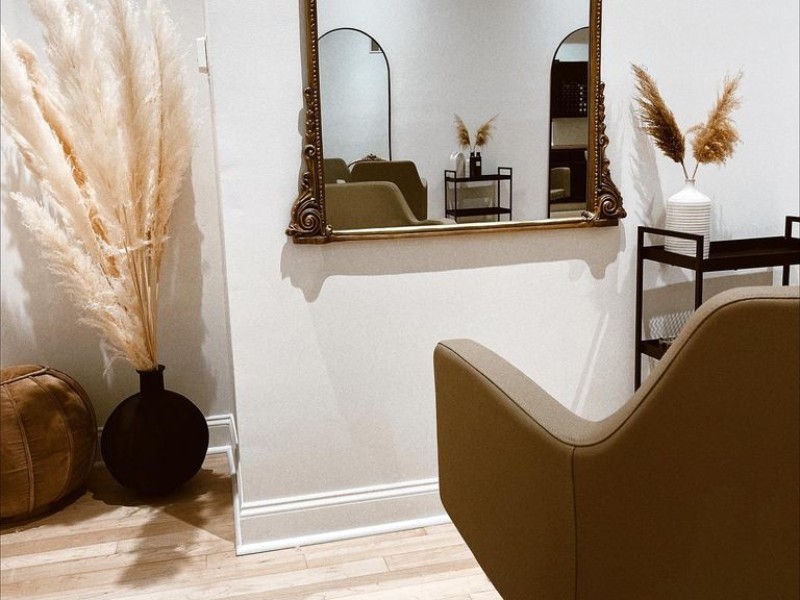 Interior of Wild Honey Salon with mirror and salon chair