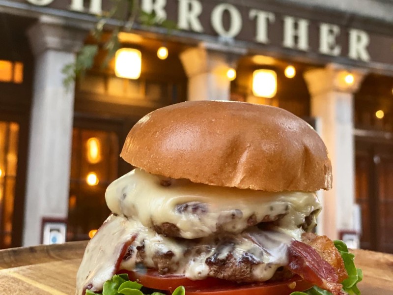 Photo of cheeseburger outside of Oh Brother restaurant