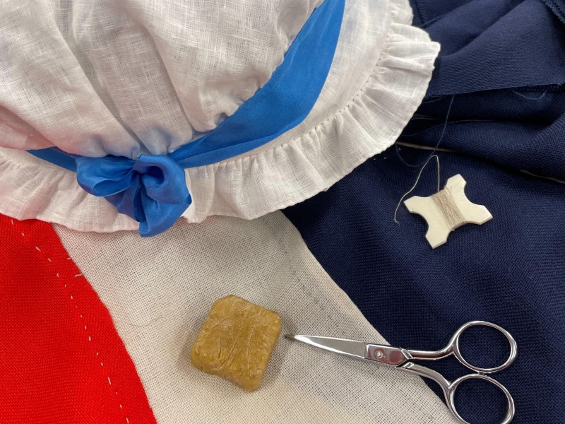Bonnet, scissors, and American flag