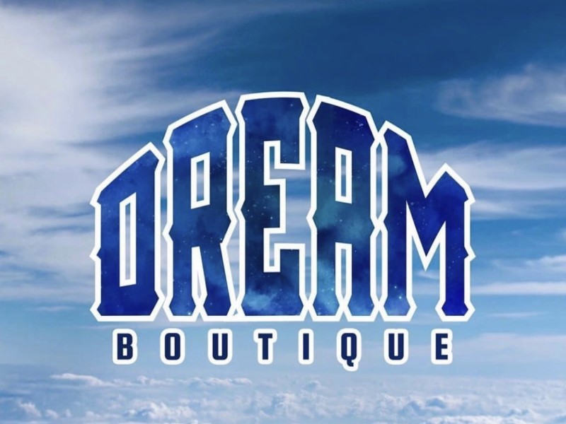 Dream Boutique logo with business name in blue text and cloud background
