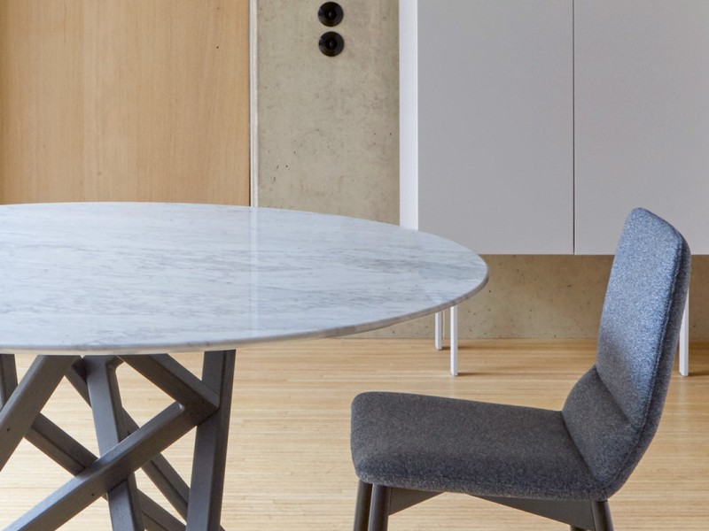 Table and chair with event information in text