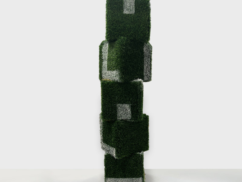 Brandon J. Donahue-Shipp | A Monument To Scrimmage | 64 x 20 x 20 inches / 162 x 50 x 50 cm, astro Turf, spray paint, wood, 2025