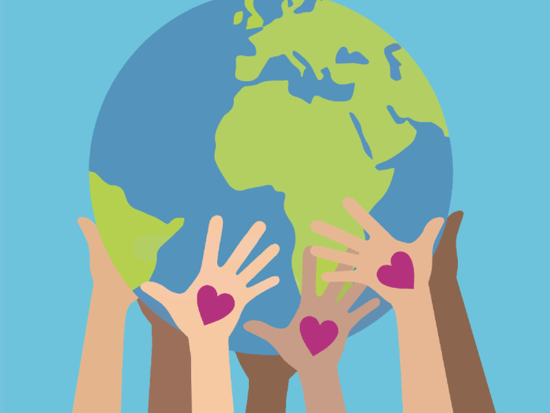 Hand holding the world with hearts 