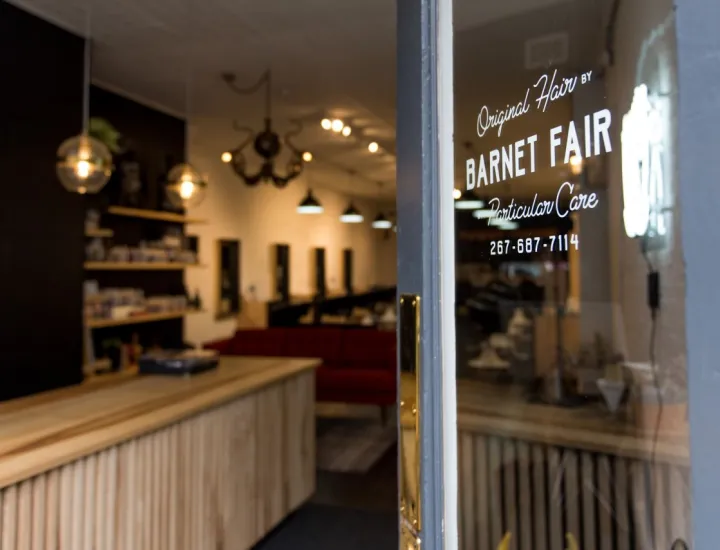 Front door of salon open, looking into Barnet Fair Salon