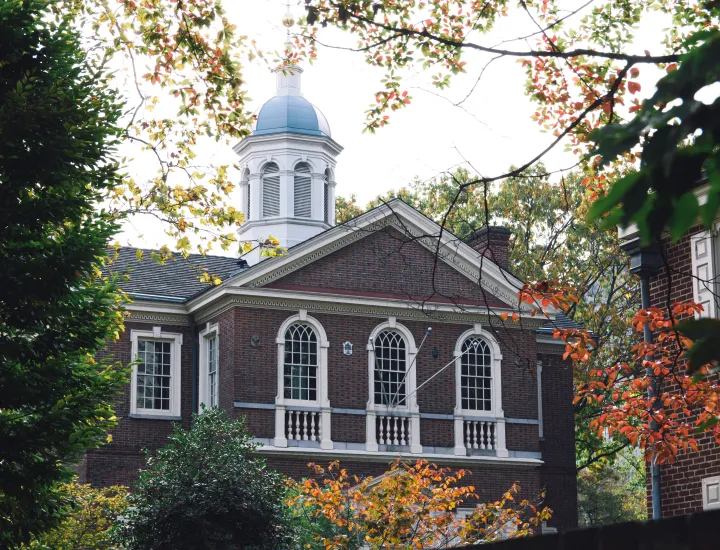 Exterior of Carpenters' Hall on a fall day with fall foliage