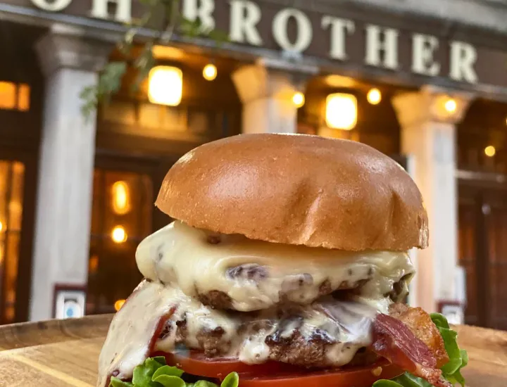 Photo of cheeseburger outside of Oh Brother restaurant