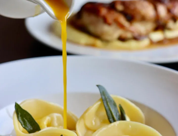  Goat’s milk burrata filled pasta, kabocha squash, and sage ⁠brown butter brodo