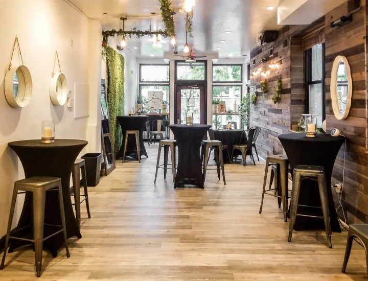 Old City Social interior with tables set up with linens