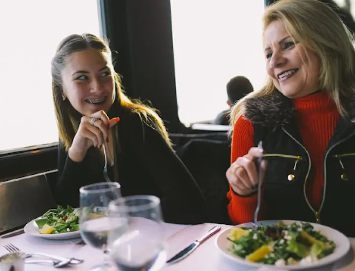 Mother and daughter laughing while on City Cruises