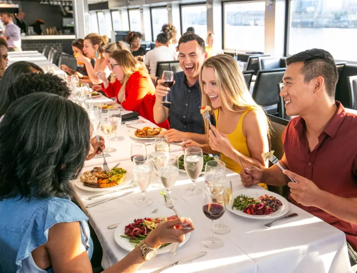 Guests eating aboard vessel