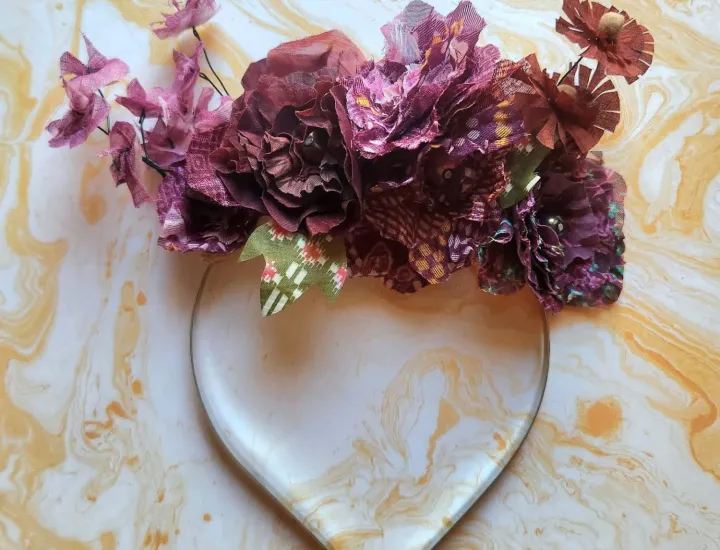 Handmade silk petals form a headband 