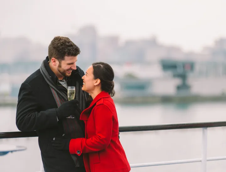Couple outside on boat.