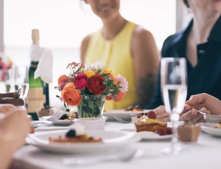 Flowers and champagne on table